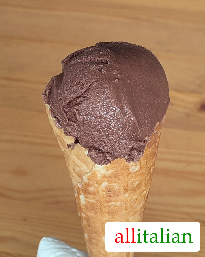 Homemade vegan chocolate ice cream on a cone