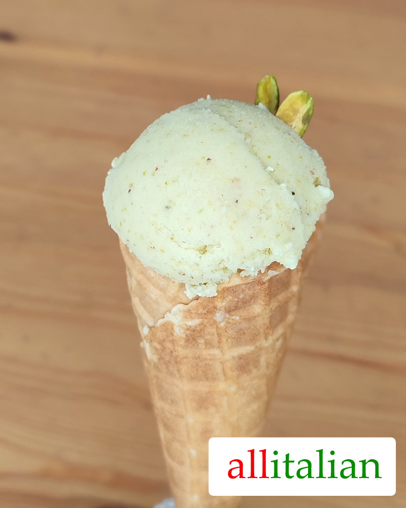 Homemade Pistachio Ice Cream on an ice cream cone