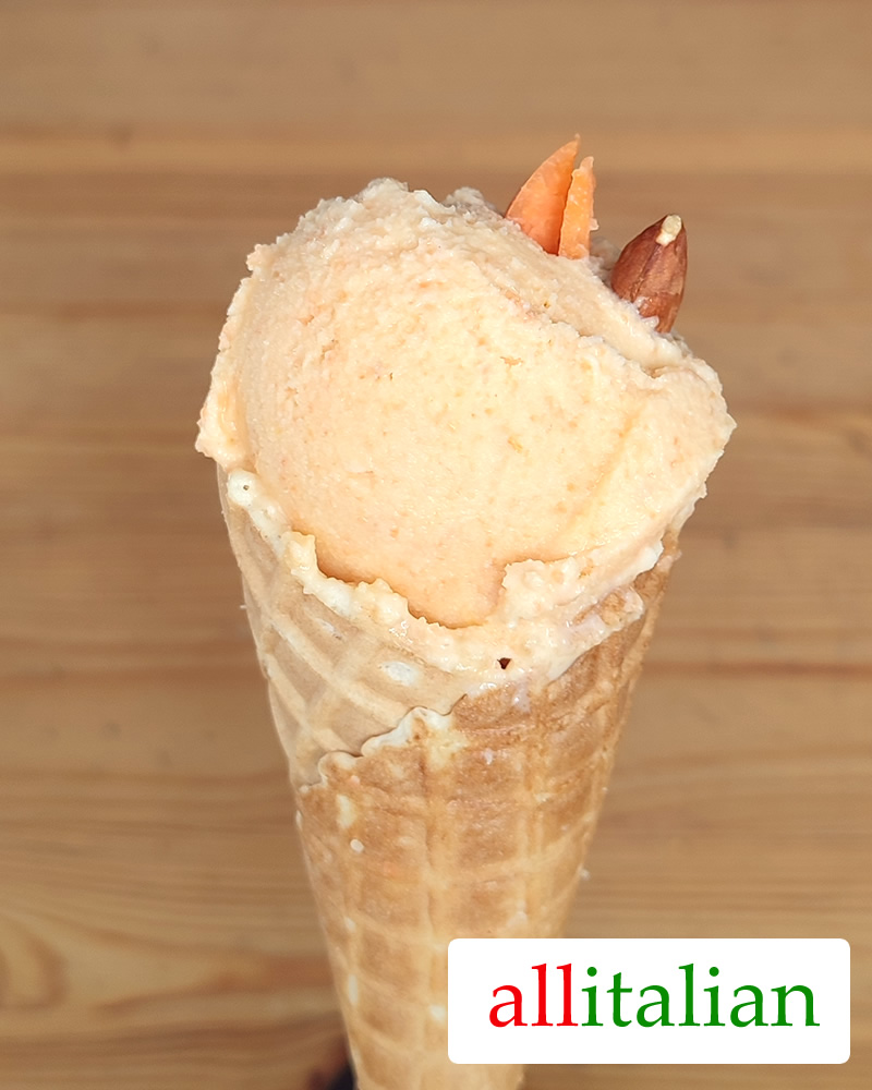Homemade carrot cake ice cream on an ice cream cone