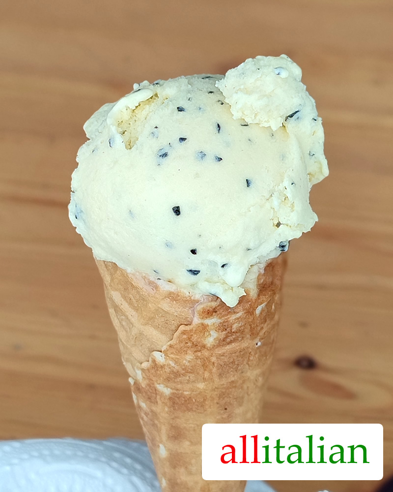 Homemade passion fruit ice cream on a cone