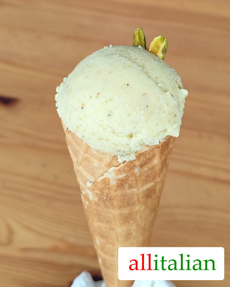 Homemade vegan pistachio ice cream on a cone