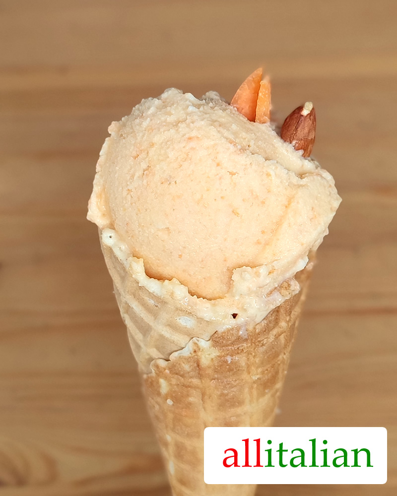 Homemade carrot cake ice cream on a cone