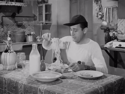 De beroemde macaroni scène in de film Un Americano a Roma