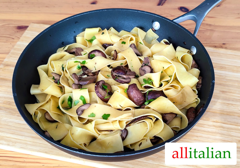 A pan of pappardelle pasta with Mushrooms